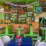 Restaurant in Costa Rica mit naiven Gemälden und Schablonenportraits südamerikanischer Politiker / © Foto: Georg Berg