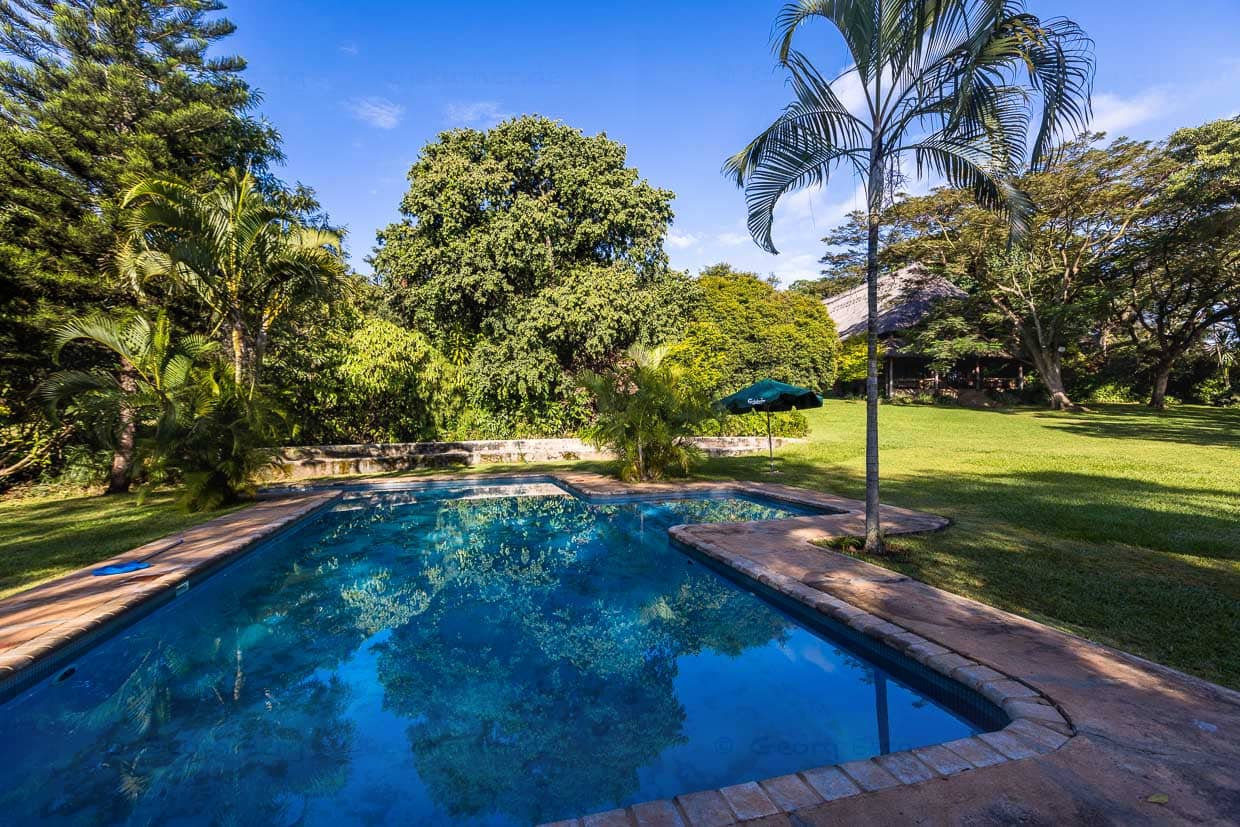 Piscine et jardin du Kumbali Country Lodge près de Lilongwe / © Photo : Georg Berg