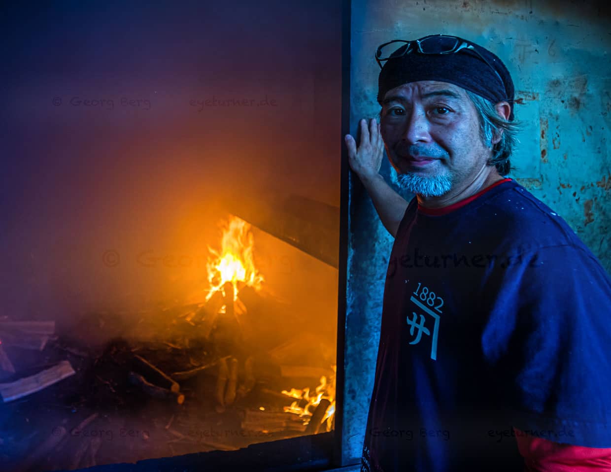 Yasuhisa Serizawa in front of the walk-in smoker at his Katsuobushi manufactory. He uses the oldest method of fish preservation to produce a delicacy / © Photo: Georg Berg